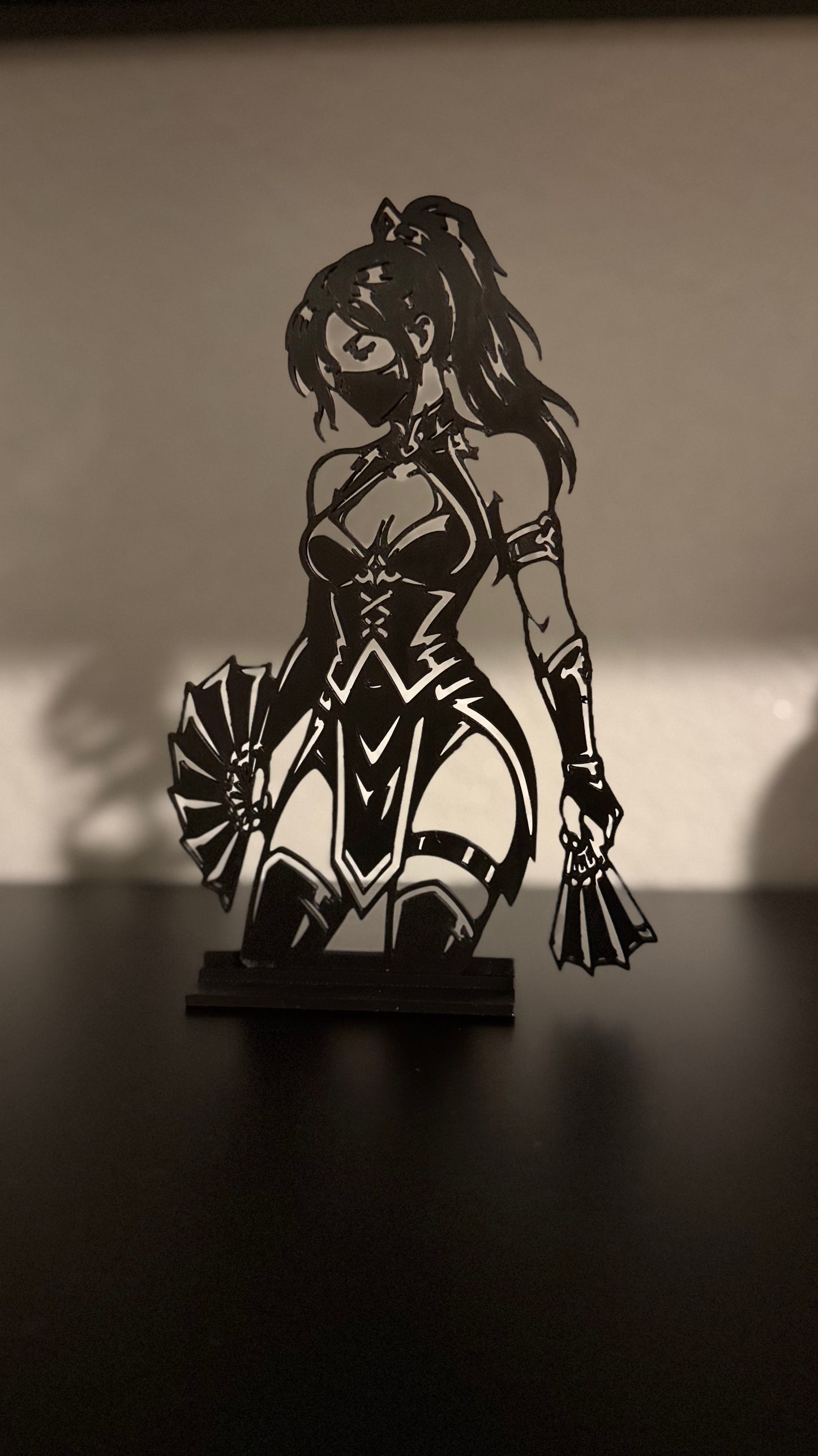 3D printed Kitana silhouette display figure from Mortal Kombat on a black base