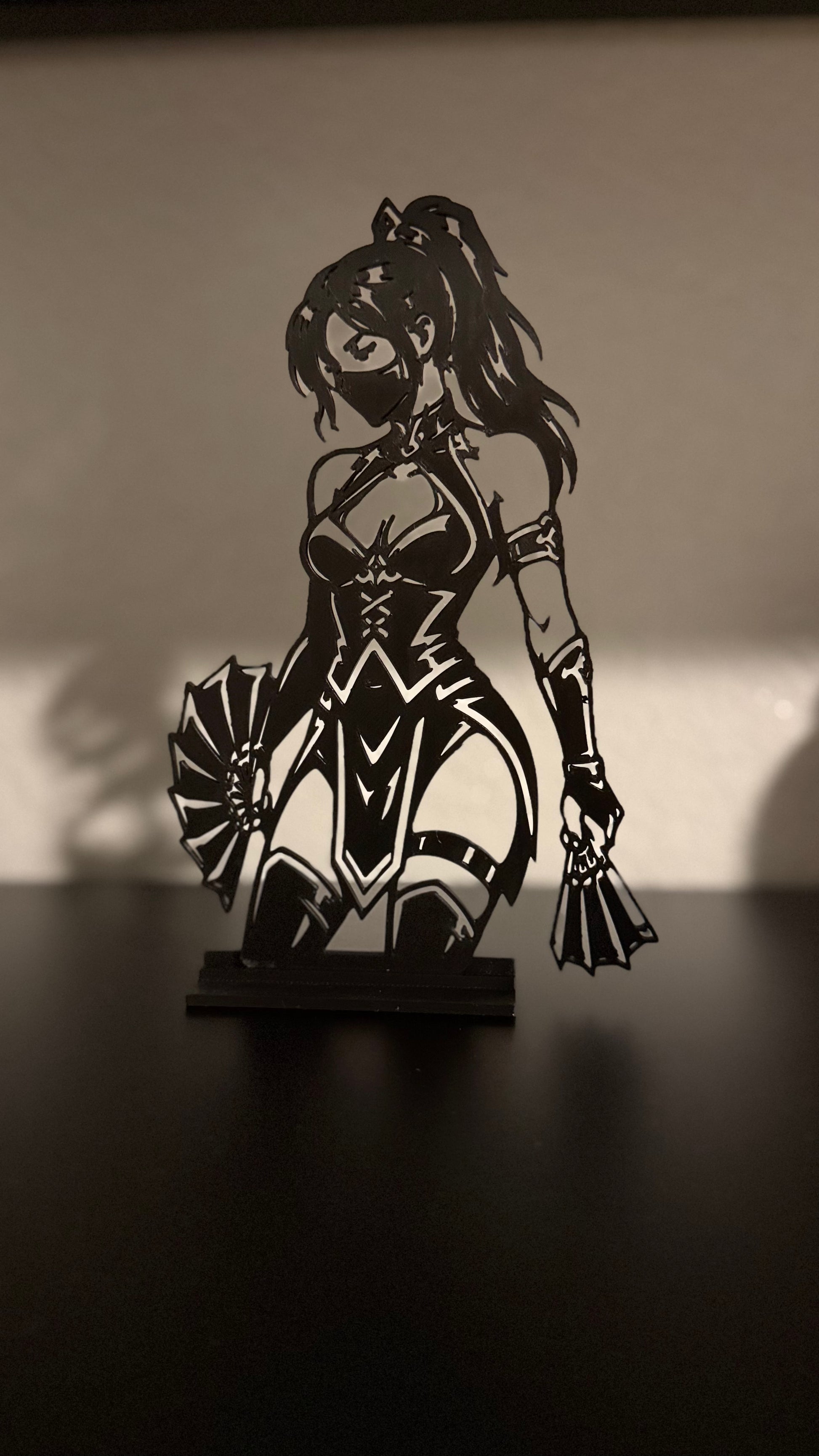 3D printed Kitana silhouette display figure from Mortal Kombat on a black base